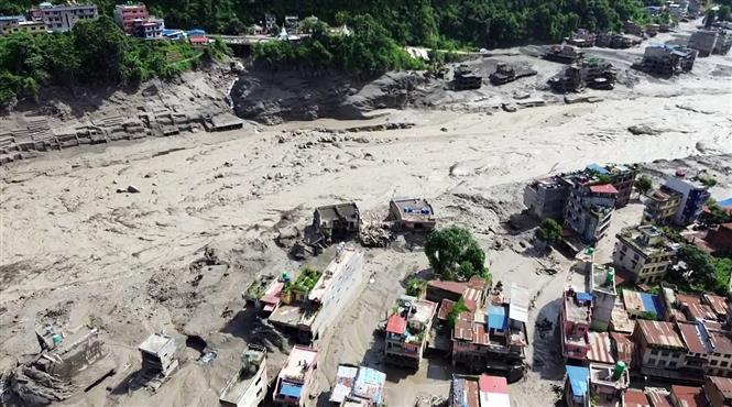 2882026nepal-1787874408418-17878744089701922831879 Lũ lụt ở Nepal-Tây Tạng khiến ít nhất 1.860 người chết, mất tích khi nguy cơ mới cận kề- Ảnh 1.